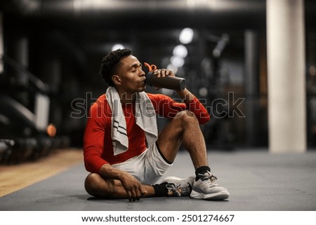 Similar – Image, Stock Photo Man resting in water with guitar at seaside