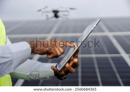 Similar – Foto Bild Unerkennbarer Ingenieur am Solarpanel