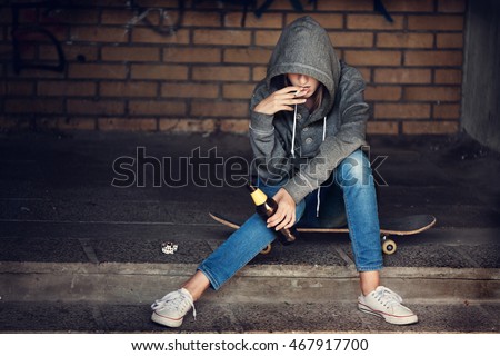 Similar – Foto Bild Teenager-Mädchen mit Rauchzeichen am Strand