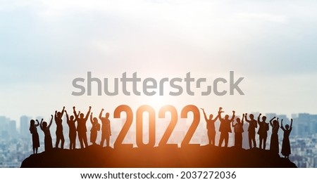 New year concept of 2022. Cheerful group of people. New year card.
