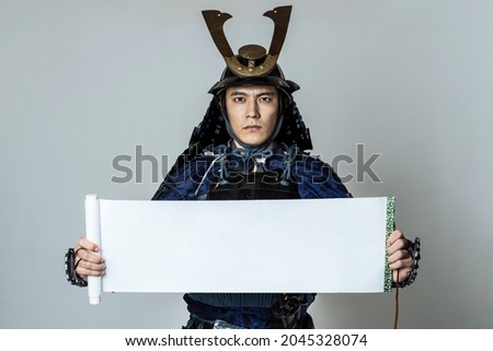 Japanese armed samurai who holds a scroll. Photo stock © 
