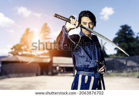 Japanese samurai wielding a katana. Photo stock © 