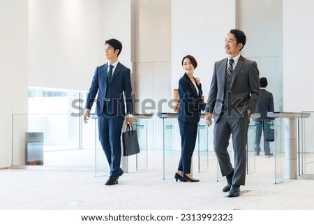 Similar – Image, Stock Photo From coming and going. Autumn in the city with blurred people in the background