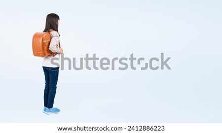 Similar – Image, Stock Photo Anonymous person standing looking at islet with coniferous trees in lake