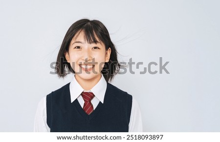Similar – Image, Stock Photo teenager looks at her mobile phone