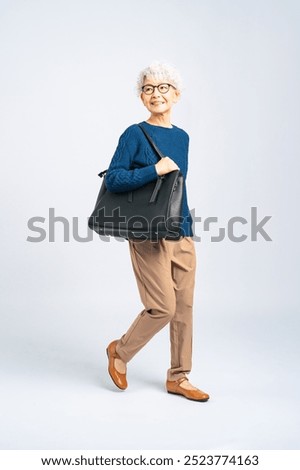 Similar – Image, Stock Photo tourist walking on the street visiting Bilbao city, Spain