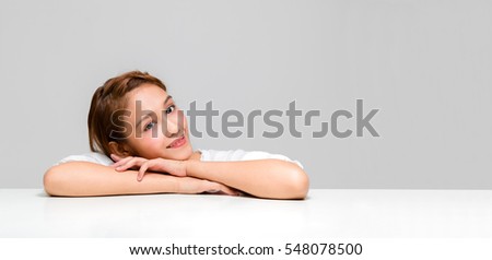 Image, Stock Photo Half portrait of a young caucasian adult wearing a white mask. Copy space on the right. Man looking at the camera