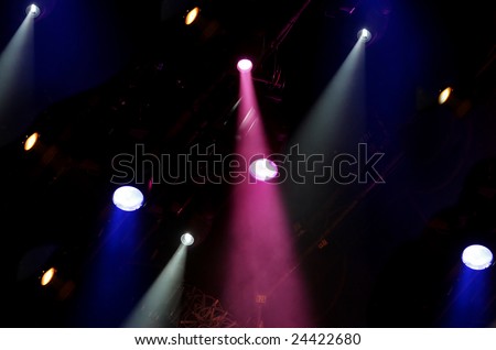 large group of bright stage lights shining down