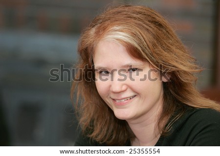 one adult female woman head shots in a natural setting