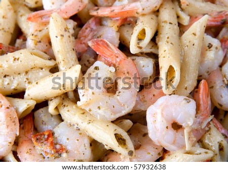 closeup macro of shrimp pasta filling the frame. detailed close photo.