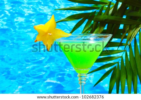 Glasses cocktail on blue sea background