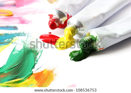 Abstract acrylic paint and paint tubes isolated on white