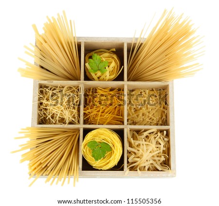 Nine types of pasta in wooden box sections isolated on white