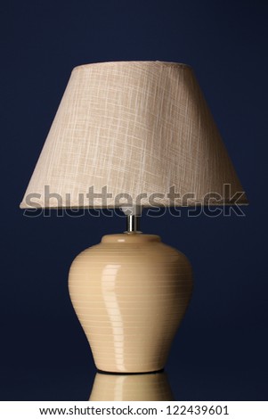 table lamp on dark blue background