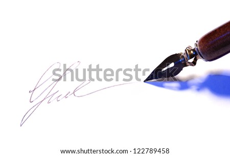 Closeup of signature (fake, not real) and ink pen, isolated on white