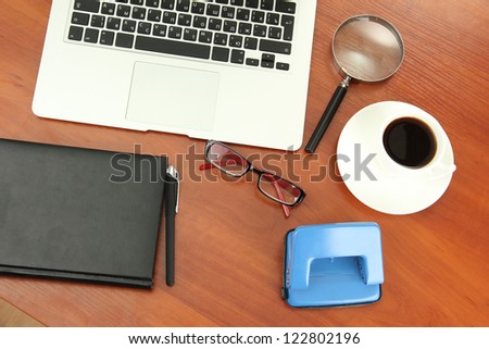 office supply and laptop isolated on white