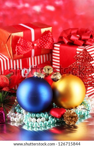 Christmas decoration and gift boxes on golden background