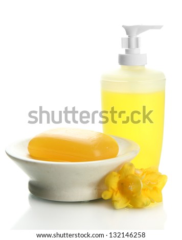 Bottle and soap-dish with soap isolated on white