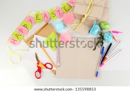 Writing letter of congratulations to Easter holidays isolated on white