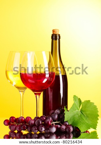 Red wine on yellow background