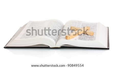 Russian bible and wooden cross isolated on white