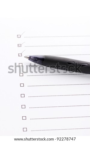 Checklist and pen closeup