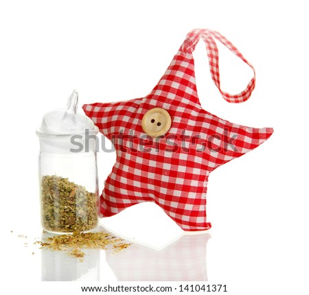 Soft toy shape of star with fragrant herbs isolated on white