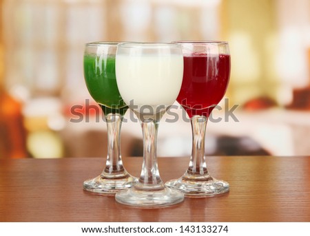 Tasty color liquors, on bright background