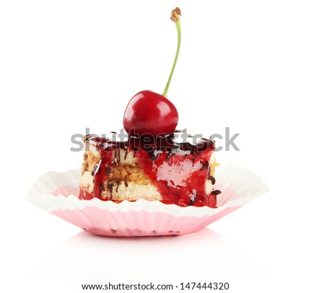 Tasty biscuit cake with jam and berry on plate, isolated on white