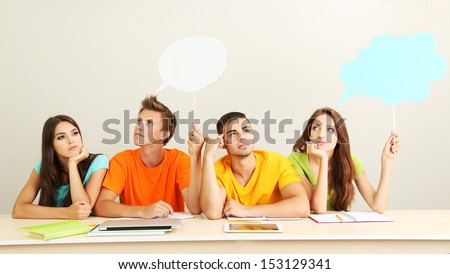 Group of young students sitting in the room