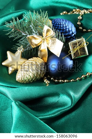 Beautiful Christmas decor on green satin cloth