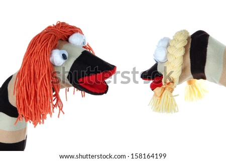 Cute socks puppet isolated on white