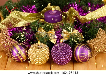 christmas composition with candles and decorations in purple and gold colors on wooden background - Purple And Gold Christmas Decorations christmas composition with candles and decorations in purple and gold colors on wooden background - Purple And Gold Christmas Decorations
