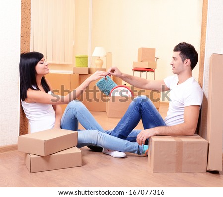 Young couple moves into new home