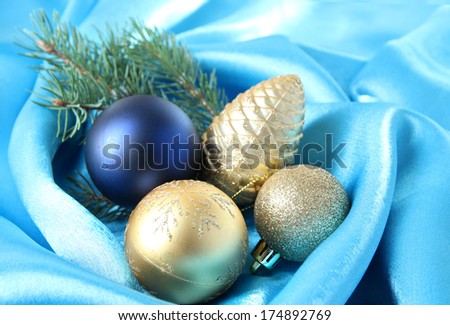 Beautiful Christmas decor on blue satin cloth