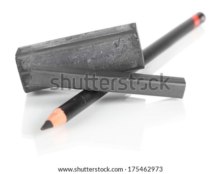 Black drawing charcoal and pencil isolated on white