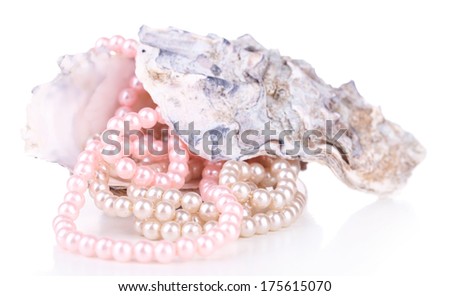 Shell with pearls, isolated on white