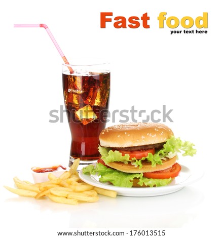 Big and tasty hamburger on plate with cola and fried potatoes isolated on white