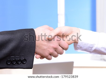 Business partners joining their hands
