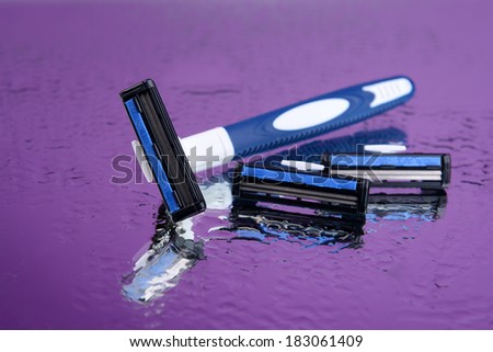 Men shaver on purple background