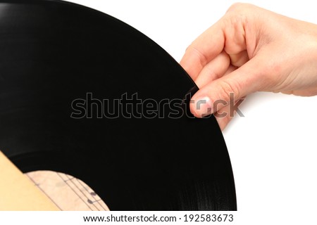 Hand opening old vinyl record, isolated on white