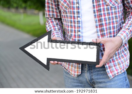 Man with pointer outdoors
