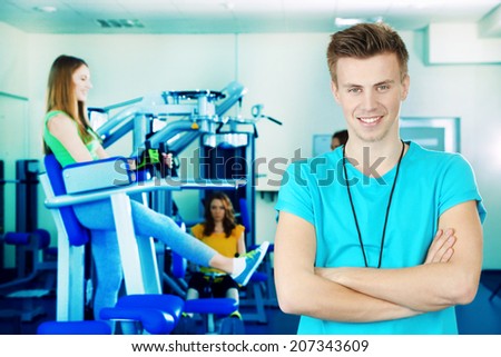 Fitness trainer at gym