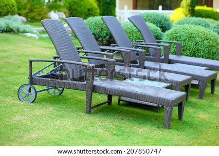 Lounge sunbed in hotel garden
