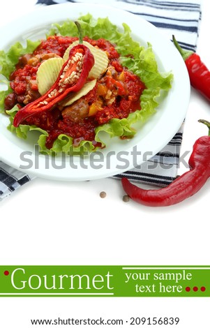 Chili Corn Carne - traditional mexican food, on white plate, isolated on white