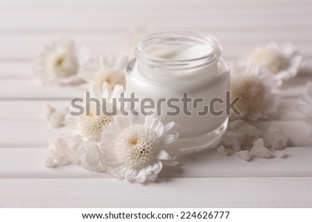 Skin cream on wooden table