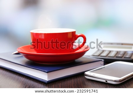 Cup of coffee in office