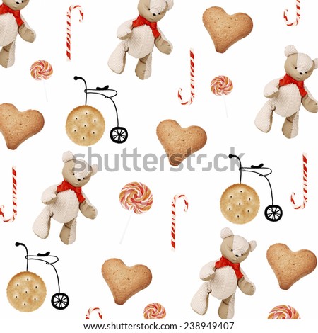 Toy bears, candies and cookies as holiday background