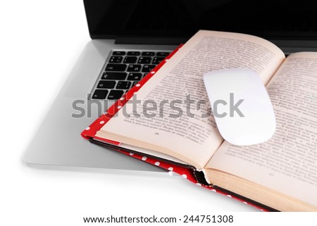 Laptop, open book and computer mouse on white background