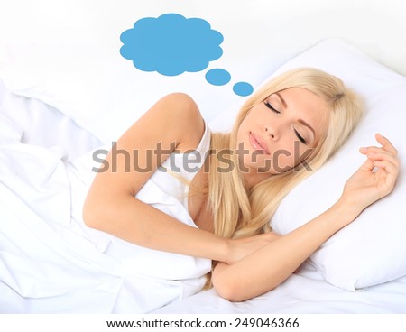 Beautiful sleeping young woman and space for text in cloud